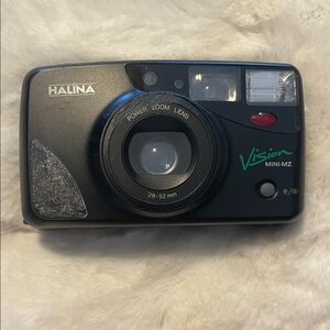 Vintage Halina Vision Mini-MZ 35mm film camera.